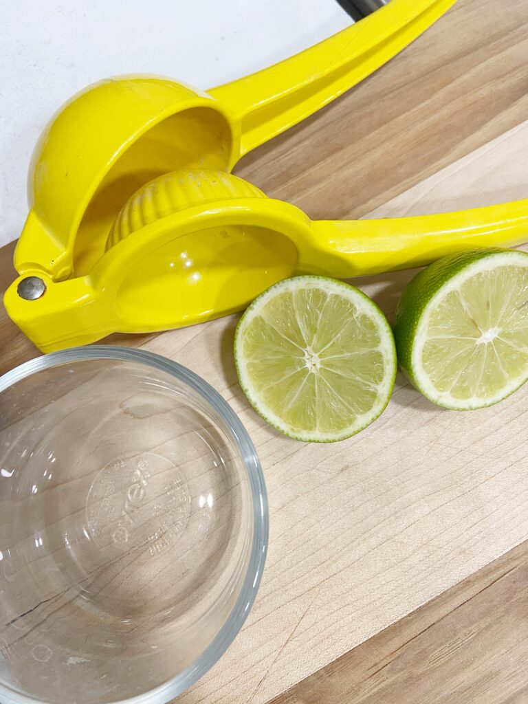 Limes and a citrus press juicer from our kitchen.